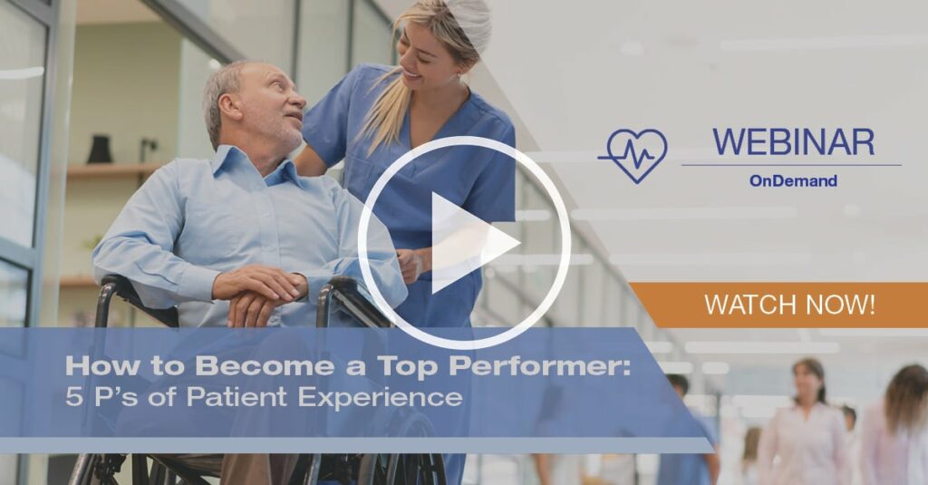 Top performing hospital employee pushing patient in wheelchair